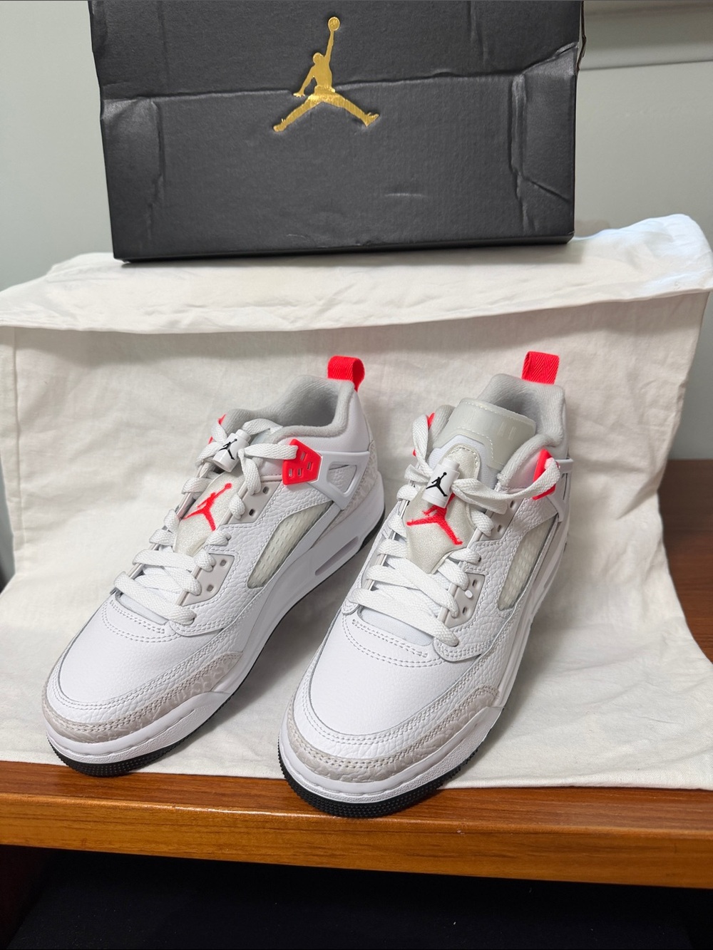 Jordan Low Top Sneakers in White with Bright Red Accents